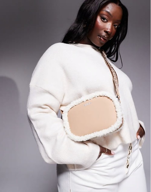 bel crossbody bag in beige with sherpa lining detail