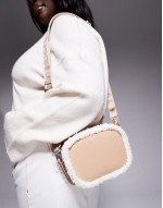bel crossbody bag in beige with sherpa lining detail