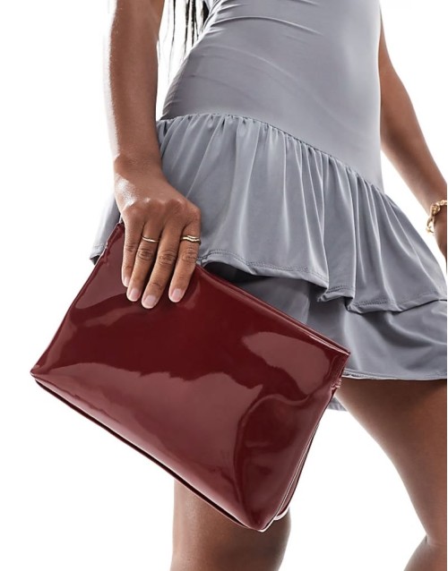 zip top clutch in burgundy