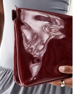 zip top clutch in burgundy