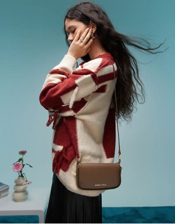 leather cross body bag in dark taupe