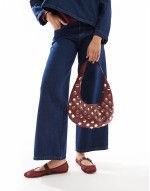 half moon studded shoulder bag in burgundy
