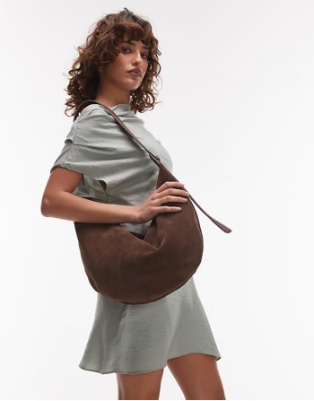 suede curved slouchy shoulder bag in chocolate brown