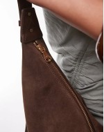 suede curved slouchy shoulder bag in chocolate brown